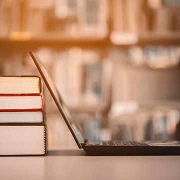 Laptop and books